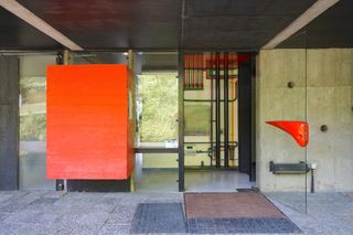 pan wogenscky house interiors in red and monochrome tones