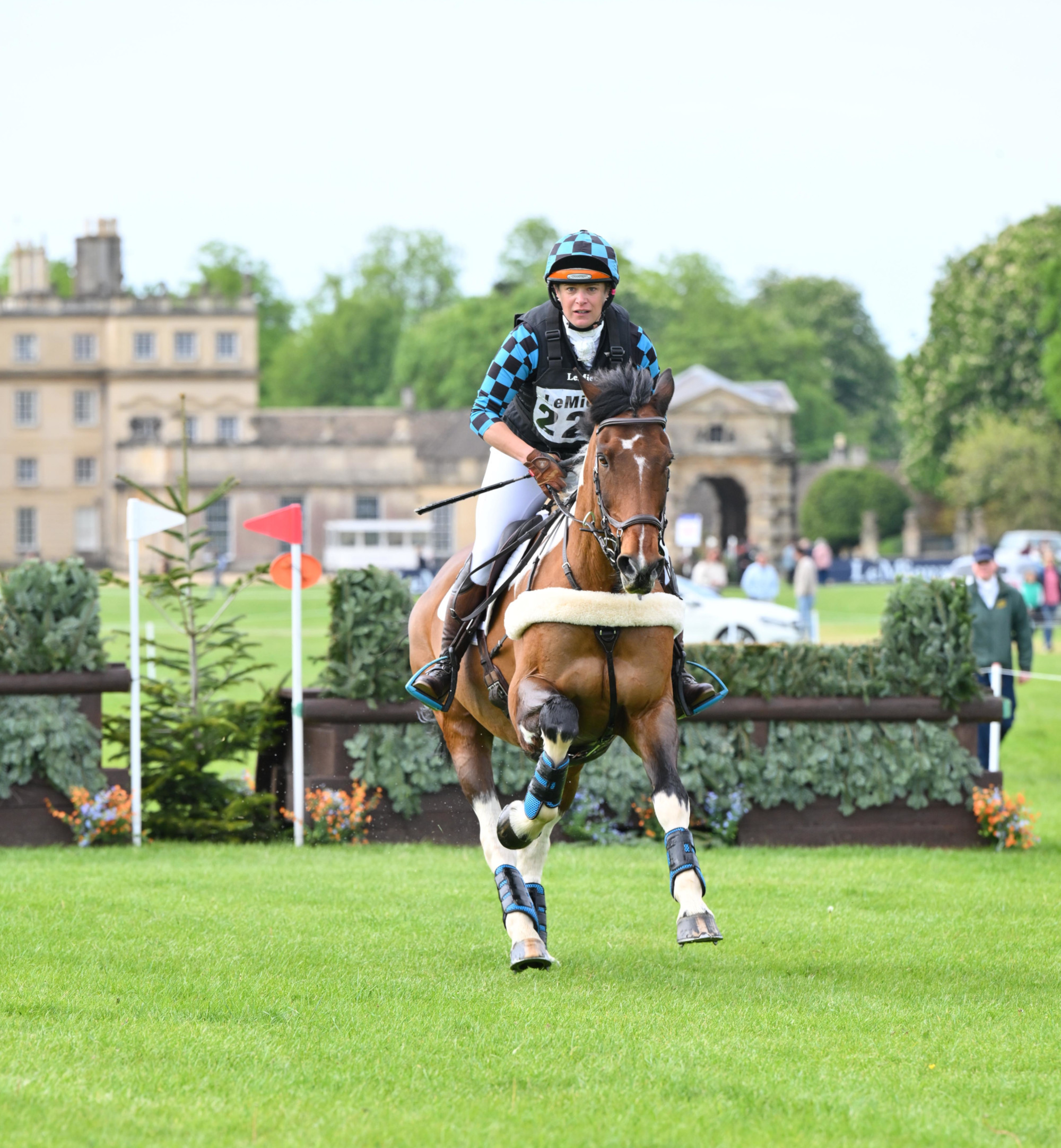 Pictured a horse and rider competing in cross-country