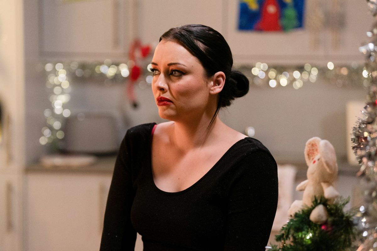 Whitney Dean looking worried in EastEnders.