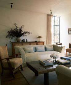 living room with linen sofa