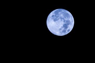 Night sky watcher Tomsajinsa sent in this photo of the blue moon taken in NYC, August 31, 2012.