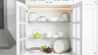 Kitchen shelves inside white cabinet