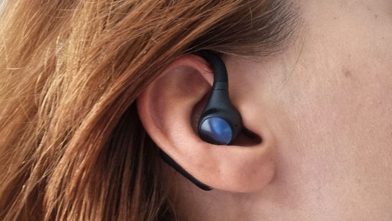 OpenRock S2 earbuds being tested by our reviewer