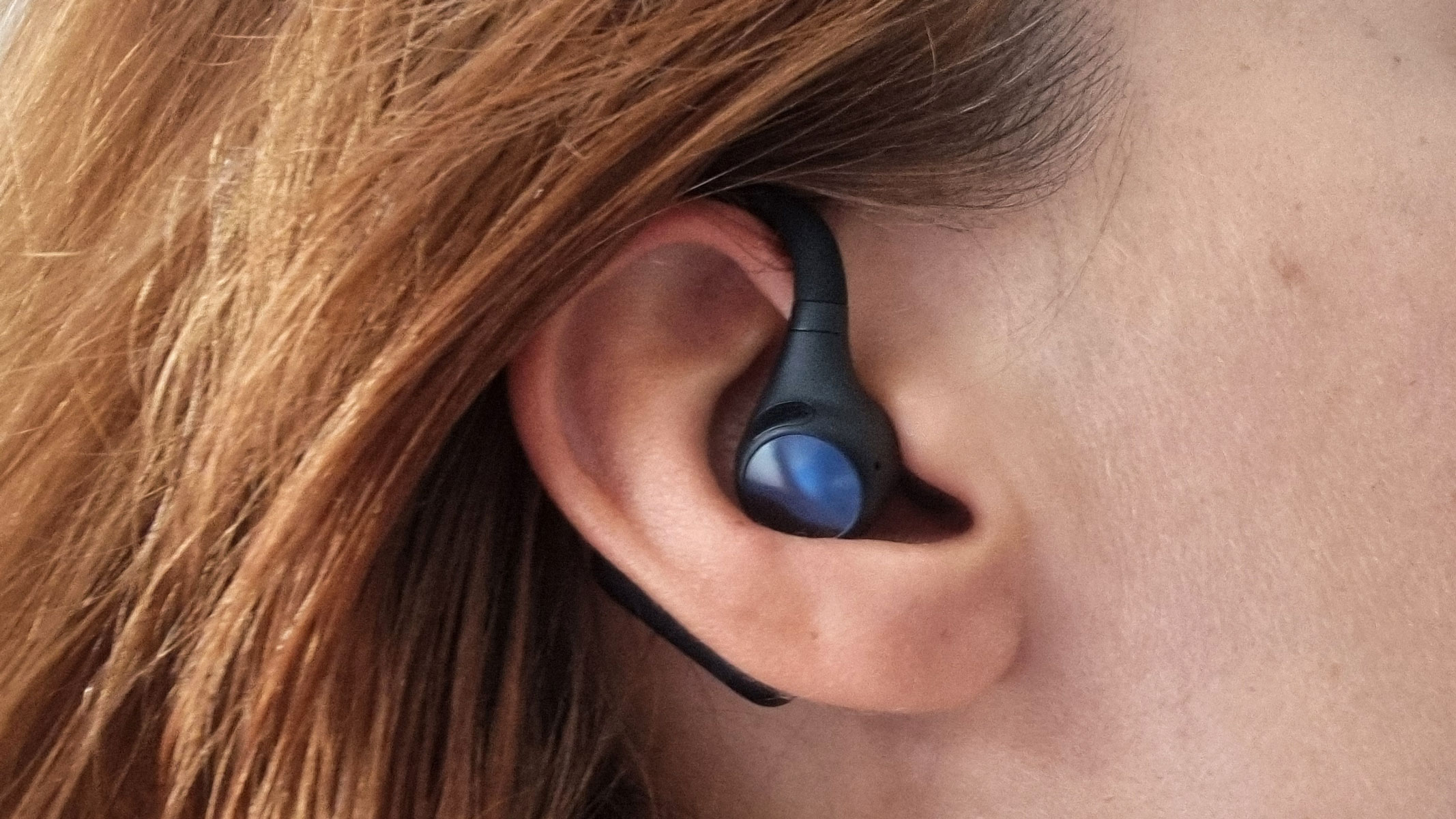 OpenRock S2 earbuds being tested by our reviewer