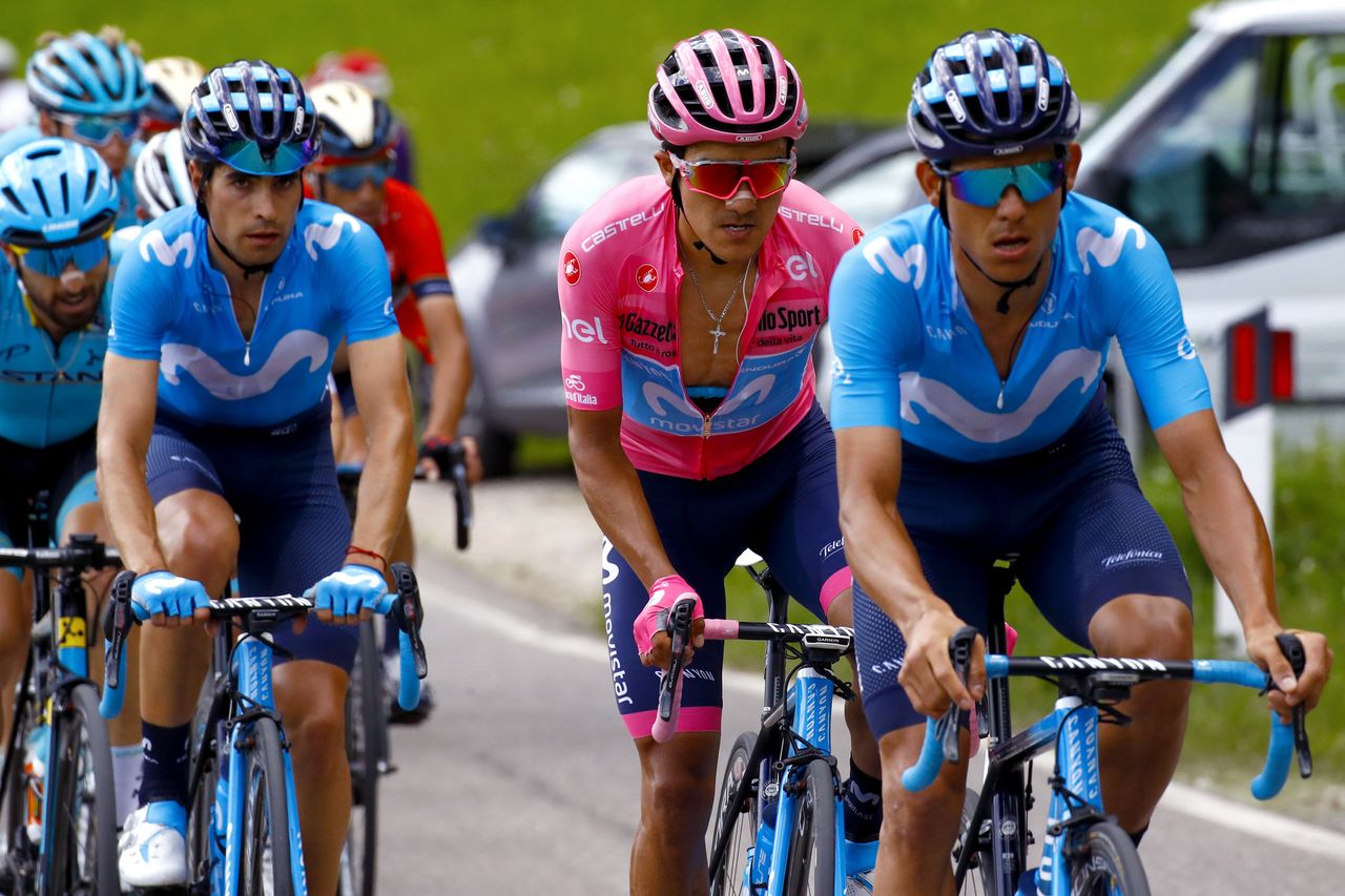 The Movistar train surrounds race leader Carapaz
