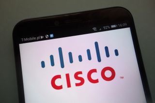 The Cisco logo shown on a smartphone