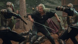 Geralt of Rivia (Henry Cavill) fights Nilfgaard soldiers in The Witcher season 3
