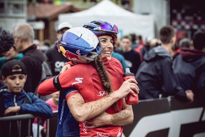 Lea Davison and Kate Courtney celebrate race results