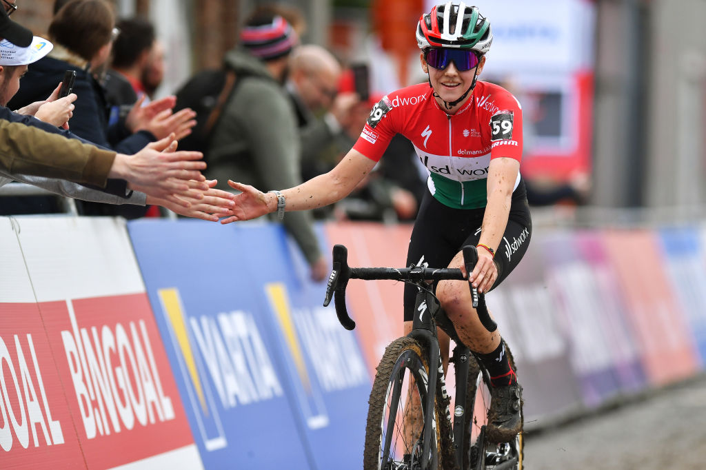 OVERIJSE BELGIUM OCTOBER 31 Blanka Vas Kata of Hungary Team SD Worx celebrates at finish line with the crowd as race winner during the 62nd Druivencross Overijse UCI CycloCross Worldcup 2021 Womens Elite DruivencrossOverijse CXWorldCup UCIcyclocrossWC on October 31 2021 in Overijse Belgium Photo by Luc ClaessenGetty Images