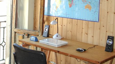 An Apple iBook G4 laptop on a desk