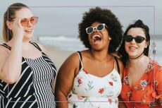 Group of girls laughing on the beach