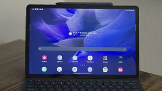 The Samsung Galaxy Tab S7 FE with attached Slim Book Cover Keyboard