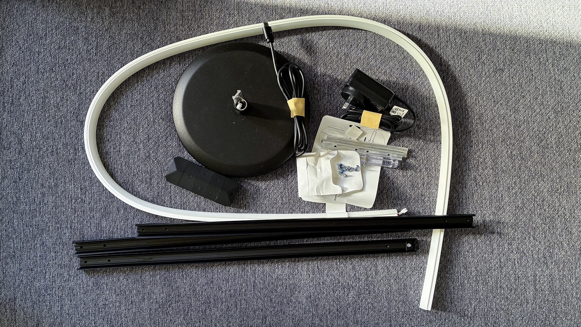 The different parts of the Nanoleaf Smart Multicolor Floor Lamp before assembly