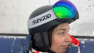 Julia wearing SunGod ski goggles on the ski lift