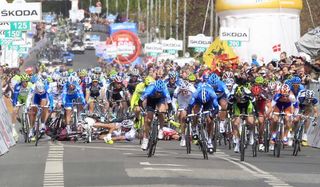 Matt Goss (Orica-GreenEdge) wins while there is carnage behind.