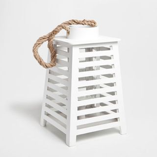 White slatted lantern with a rope handle at the top