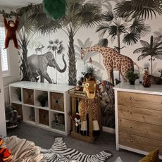 jungle theme bedroom makeover with jungle wallpaper and storage furniture