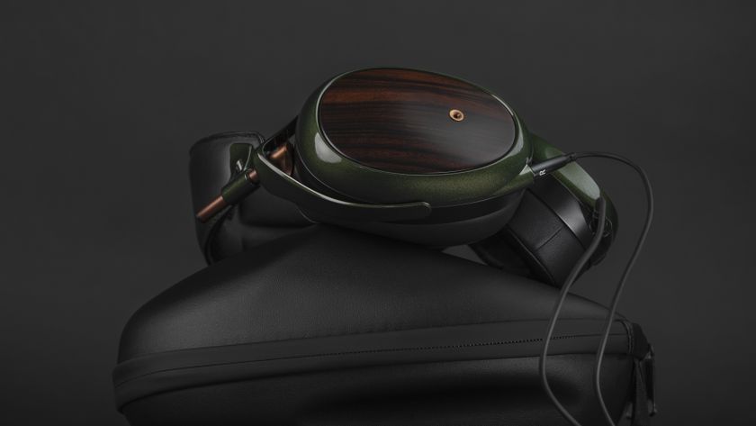 Meze Audio Strada over-ear headphones on top of their case