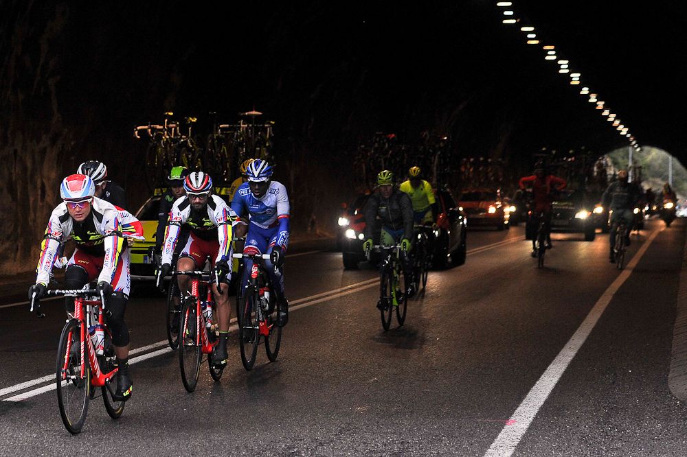 The peloton exits a tunnel during stage 2 of Volta a Catalunya.