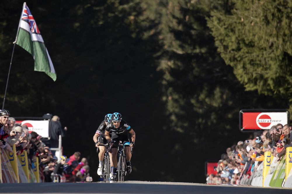 Richie Porte sprints to win, ahead of Geraint Thomas at the end of the fourth stage .