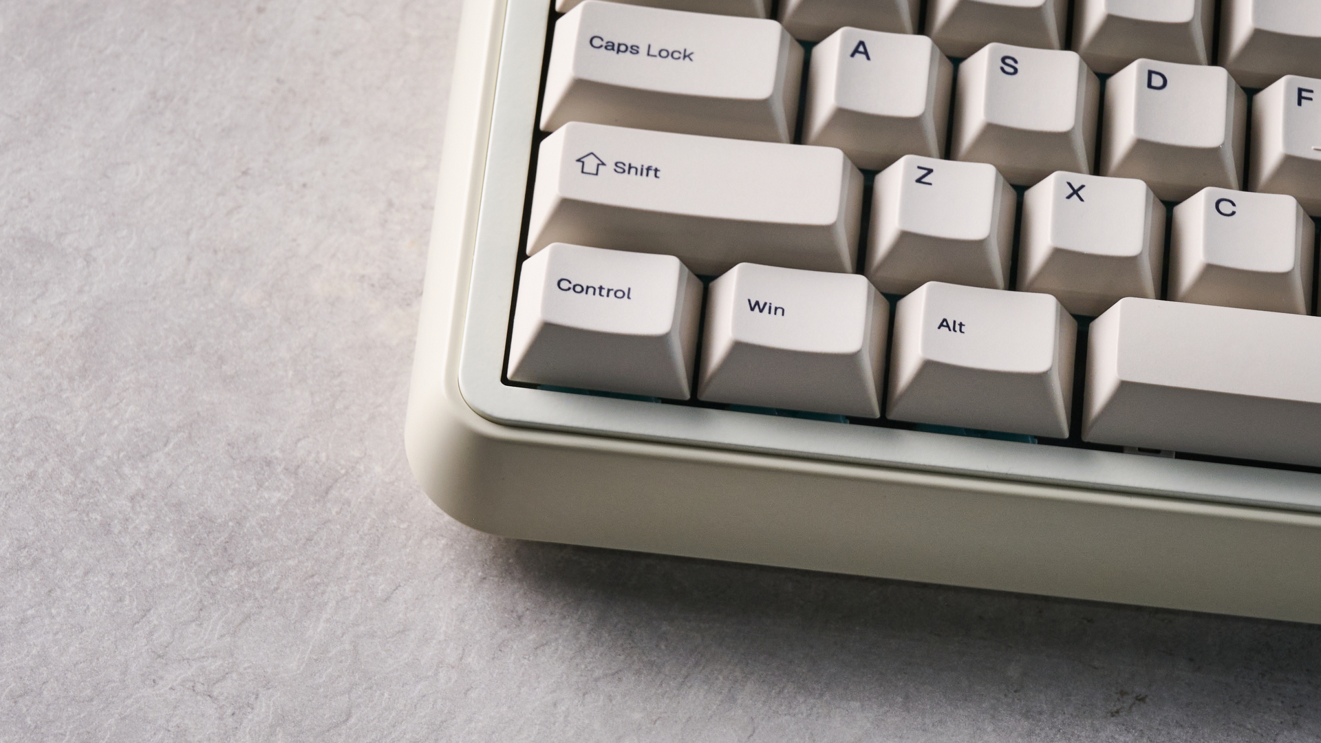 A white Epomaker RT100 Pro wireless mechanical keyboard