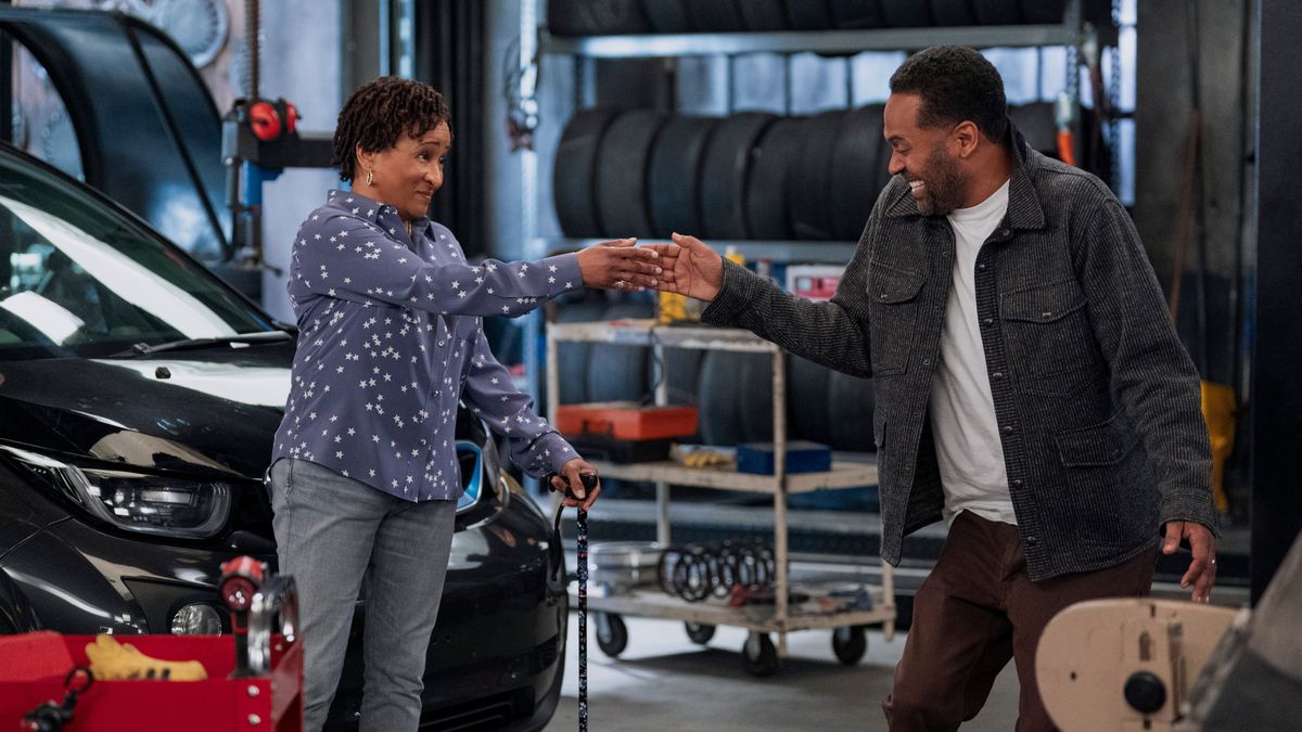 Wanda Sykes as Lucretia and Mike Epps as Bennie laughing in The Upshaws season 5