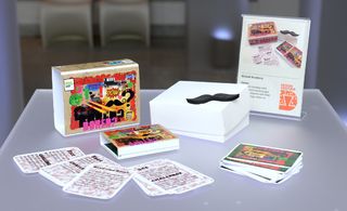A card game with its box.