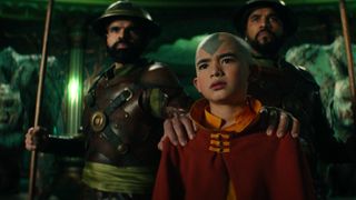 Aang (Gordon Cormier) flanked by Earth Kingdom guards in Avatar: The Last Airbender episode 4
