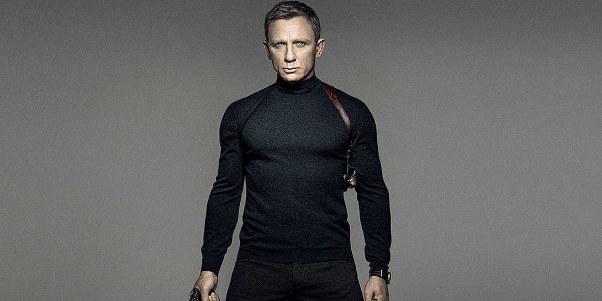 Spectre Daniel Craig wearing a turtleneck and a holster, gun drawn