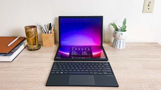 Asus Zenbook 17 Fold OLED review unit on desk with keyboard out in front