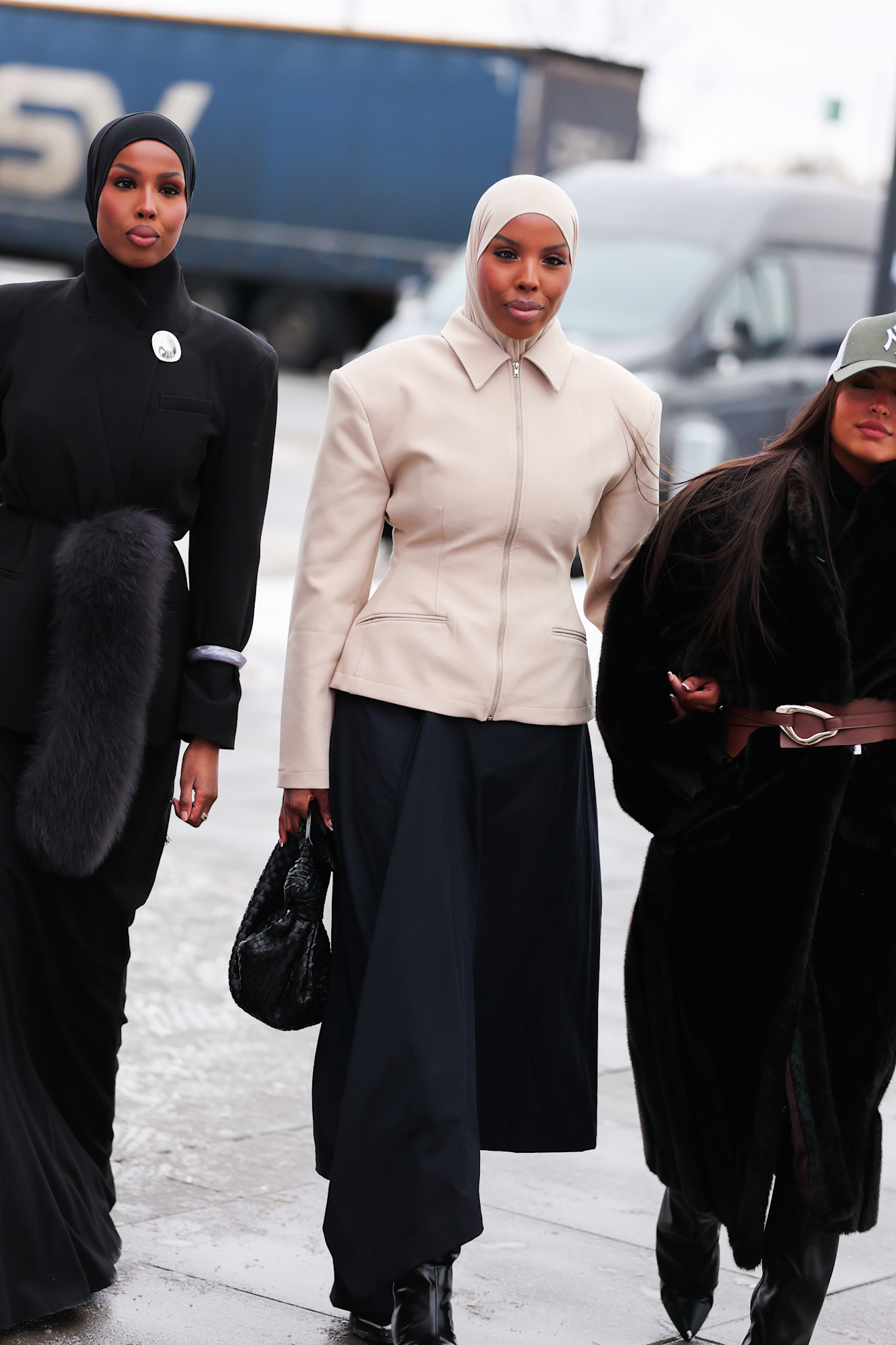 woman wearing jacket and skirt