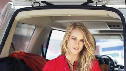 Motor vehicle, Automotive design, Automotive exterior, Vehicle door, Street fashion, Bag, Model, Long hair, Blond, Bumper, 