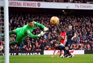 Arsenal’s Bukayo Saka sees his shot saved by Burnley goalkeeper Nick Pope during the Premier League match at the Emirates Stadium, London. Picture date: Sunday January 23, 2022