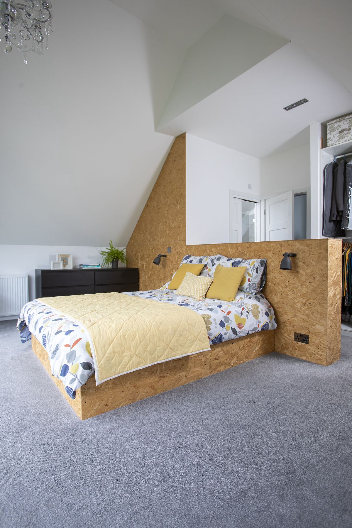 modern bedroom with vaulted ceiling