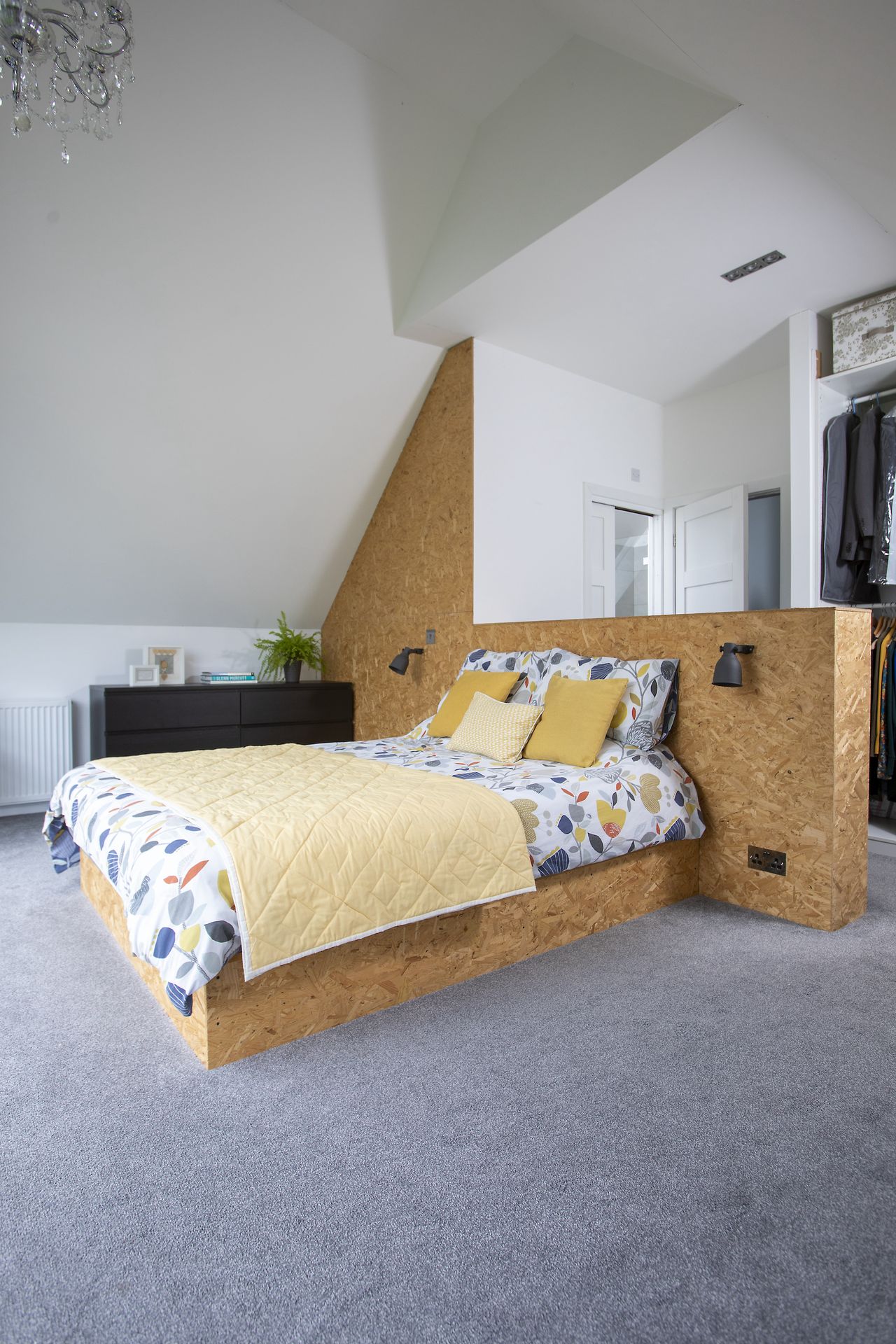 modern bedroom with vaulted ceiling