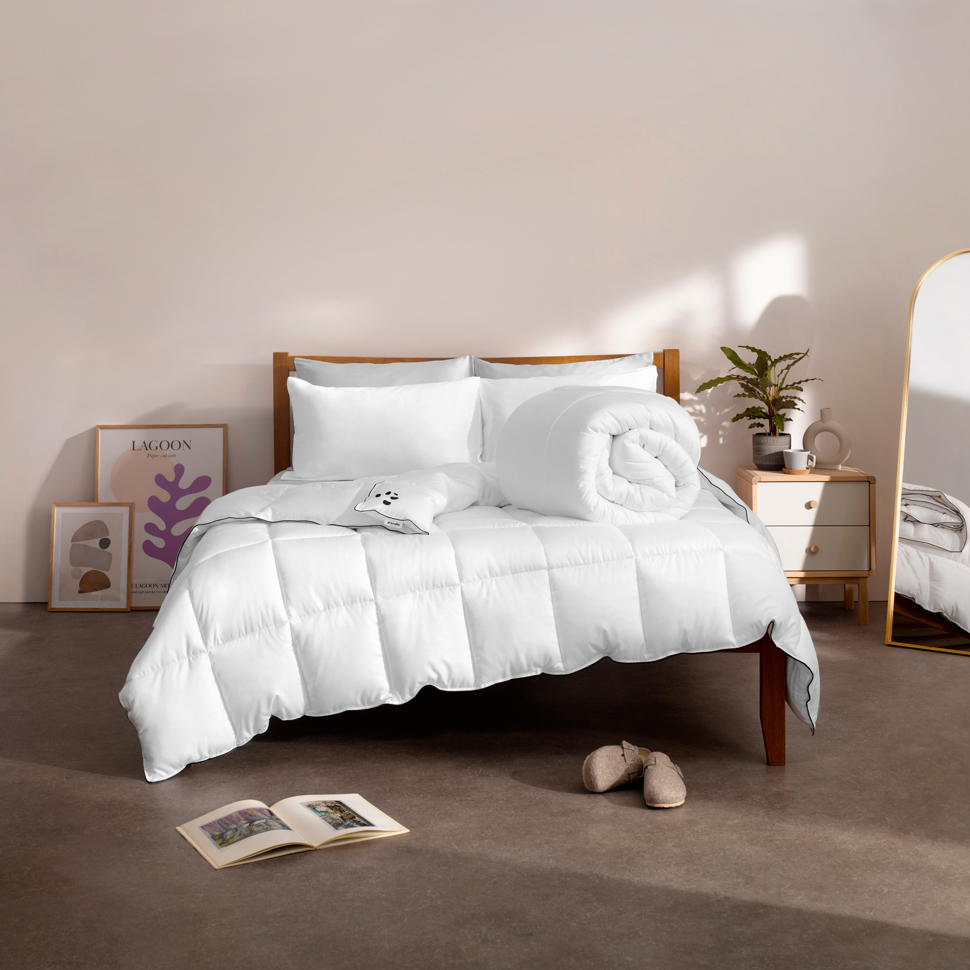 A white Panda London duvet on a bed