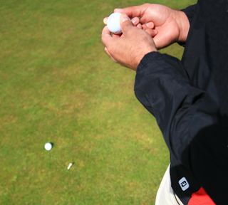 lifting interfering golf ball
