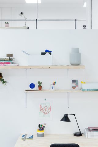design objects on wall shelves at many studios in glasgow