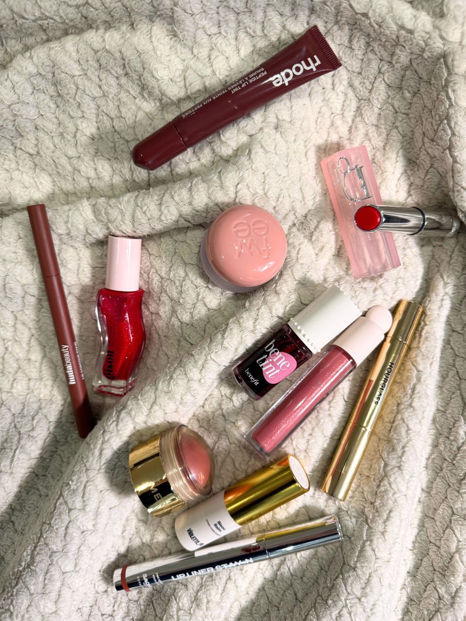 An image taken by Denise Primbet, showcasing various lip products