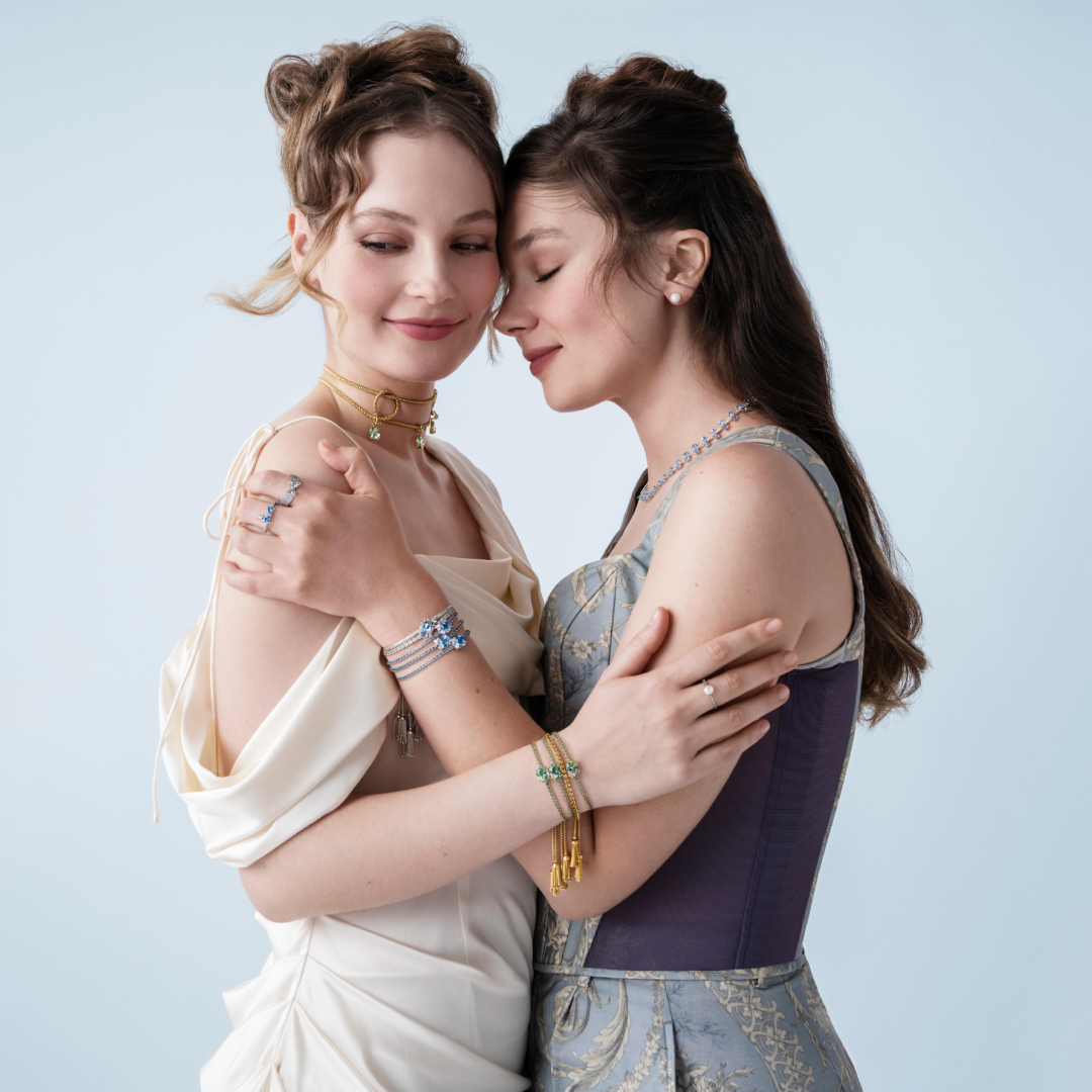 Bridgerton actresses Hannah Dodd and Claudia Jessie wearing jewelry from the Pandora x 'Bridgerton' collection.
