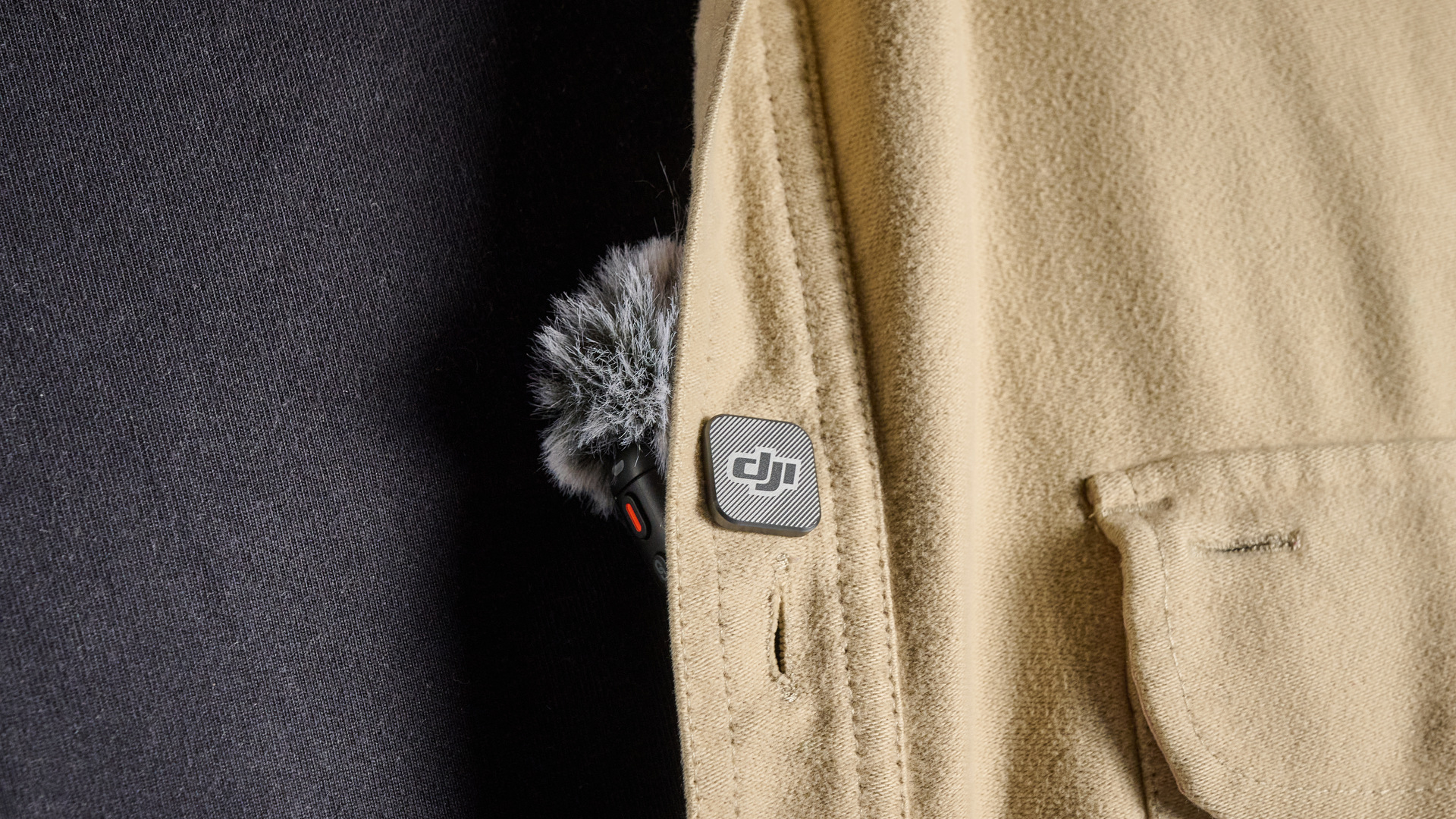 The DJI Mic 3 magnetically clipped to a shirt