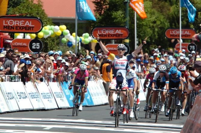 Andre Greipel (Lotto Belisol) salutes as he crosses the finish line in Lobethal