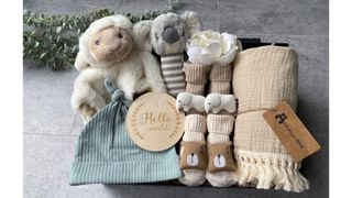 a bespoke new baby gift set from Neutrum Bea on Etsy