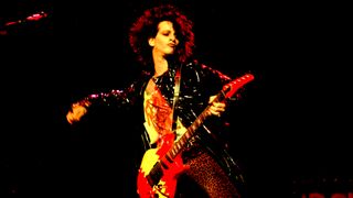 Steve Stevens plays guitar as part of Billy Idol's band during the 'Rebel Yell' tour at the Poplar Creek Music Theater, Hoffman Estates, Illinois, June 1, 1984.