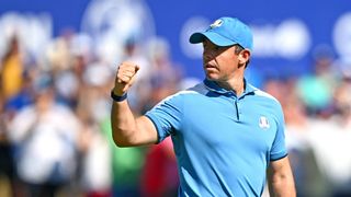 Rory McIlroy fist bumps during the 2023 Ryder Cup