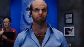 Tom Cruise with glasses and a beard and a bald head.