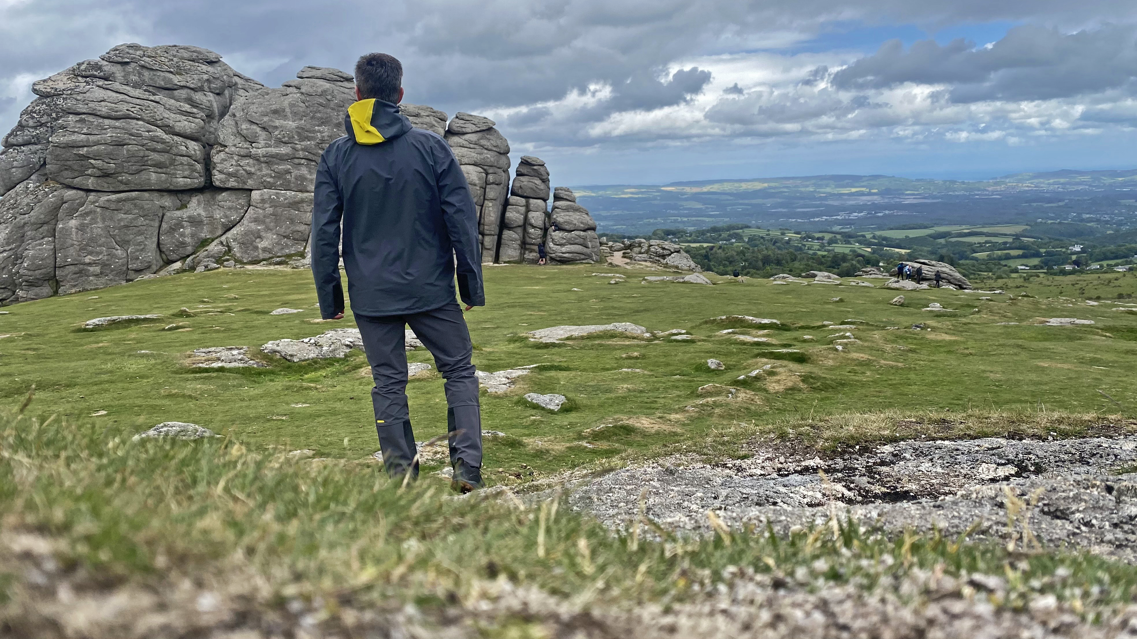 Hiker wearing the Haglofs L.I.M. ZT II GTX by Haytor on Dartmoor