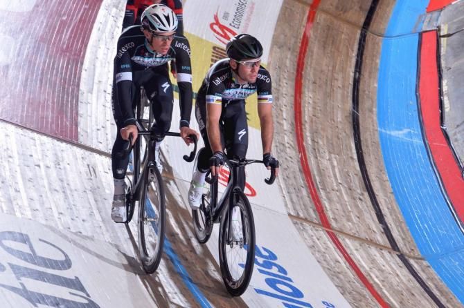 Iljo Keisse and Mark Cavendish riding side-by-side on the track