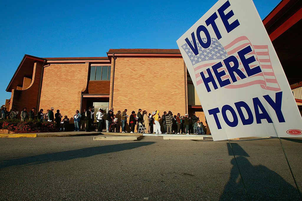 Voters waiting in line.