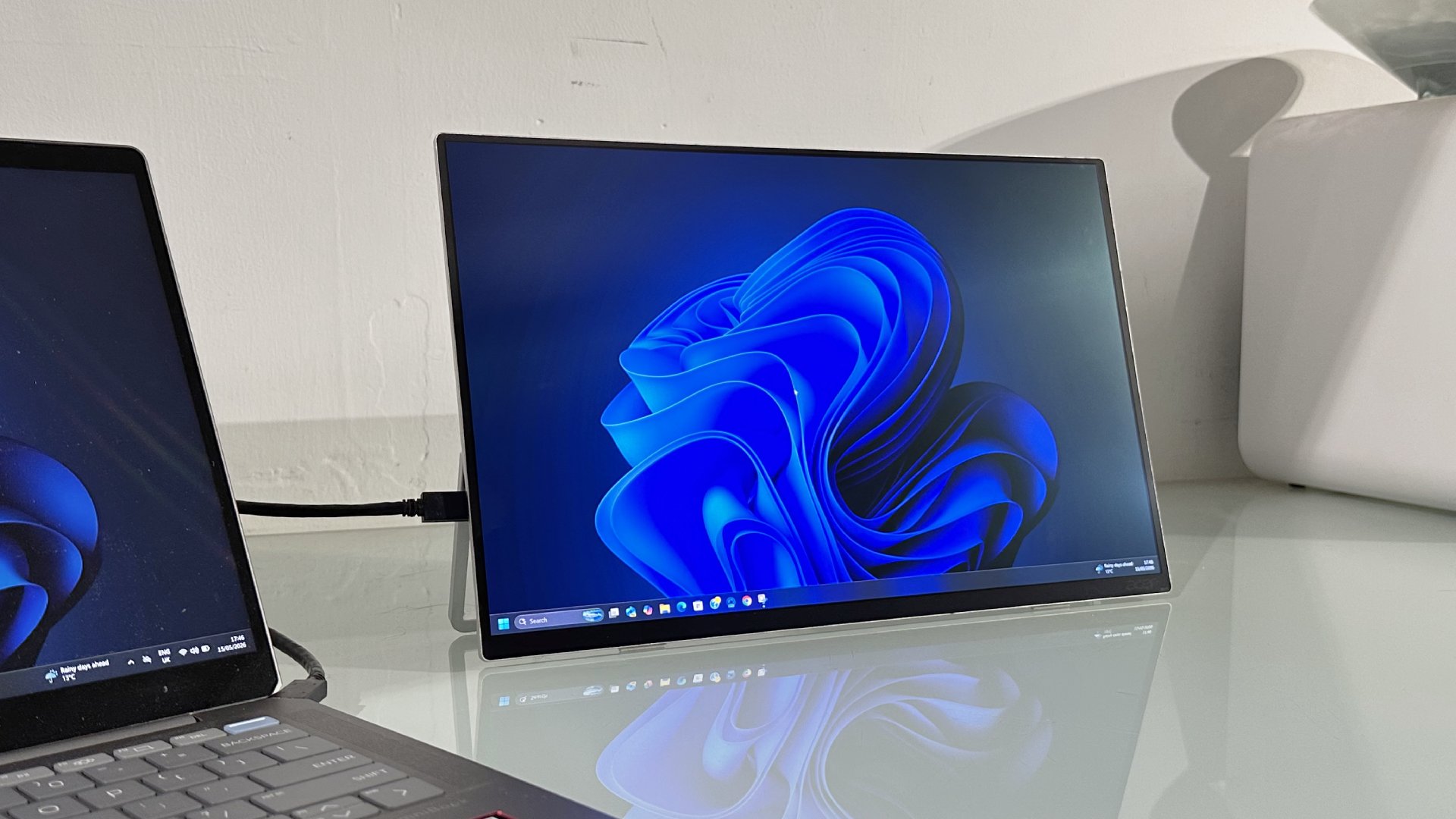 Testing the Acer ProDesigner PE160WUT in a home office next to a MacBook